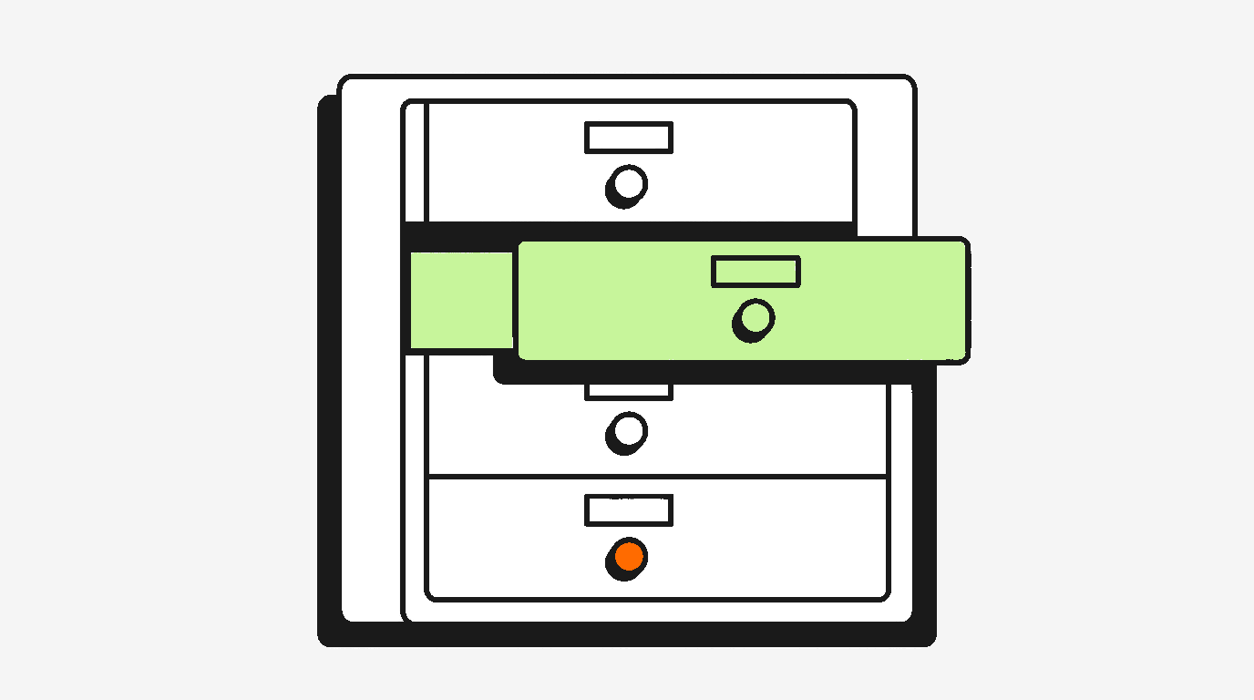 A four-drawer card catalog cabinet with the second drawer pulled open